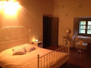Postel nebo postele na pokoji v ubytování Agriturismo Le Dogane