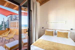 Postel nebo postele na pokoji v ubytování ecoGrusApartments