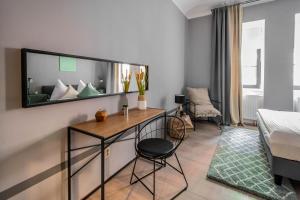 TV a/nebo společenská místnost v ubytování Stylish Apartments close to Eden Garden