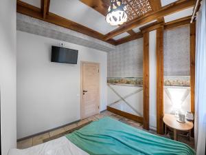 TV a/nebo společenská místnost v ubytování Eco Hostel DROVA