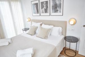 Apartamentos La Bola Suite客房内的一张或多张床位