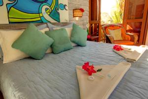 Cama ou camas em um quarto em Pousada Vila Boa Vida mais 37 fotos