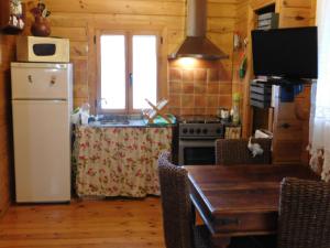 Kuchyňa alebo kuchynka v ubytovaní Casa La Colina Mandarina I