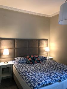 Posteľ alebo postele v izbe v ubytovaní CIENISTA 7 APARTMENTS