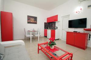 Kuchyň nebo kuchyňský kout v ubytování Apartments Kruna Jovanović