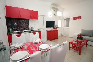 Kuchyň nebo kuchyňský kout v ubytování Apartments Kruna Jovanović