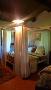 A bed or beds in a room at Posto del Sole