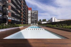 a swimming pool on the side of a building at Quartier Dorrego in Buenos Aires