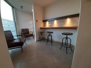 Area soggiorno di Apart Hotel Quillango
