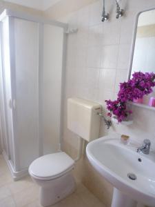 Ένα μπάνιο στο Residence Rivamare Ugento
