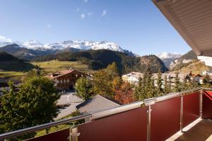 a balcony with a view of the mountains at Apart Kaltenbacher in Nauders