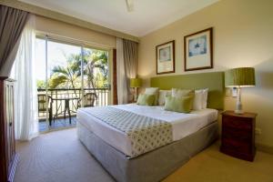Letto o letti in una camera di Paradise Links Resort Port Douglas
