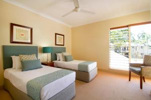Letto o letti in una camera di Paradise Links Resort Port Douglas