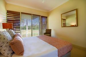Letto o letti in una camera di Paradise Links Resort Port Douglas