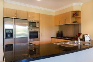 Cucina o angolo cottura di Paradise Links Resort Port Douglas