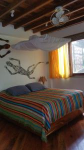 Letto o letti in una camera di Hostería Mandála