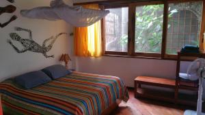 Letto o letti in una camera di Hostería Mandála