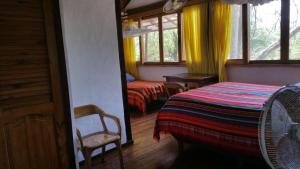 Letto o letti in una camera di Hostería Mandála