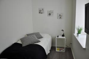 Postel nebo postele na pokoji v ubytování AB Centrum Aarhus Bed without Breakfast