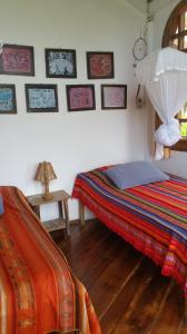 Letto o letti in una camera di Hostería Mandála