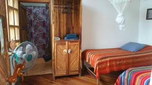 Letto o letti in una camera di Hostería Mandála