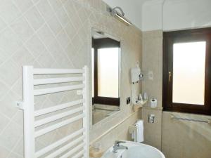 Koupelna v ubytování Hotel Riviera Fiumicino + 36 fotografií