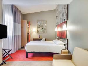 En eller flere senger på et rom på ibis Saint Germain en Laye Centre