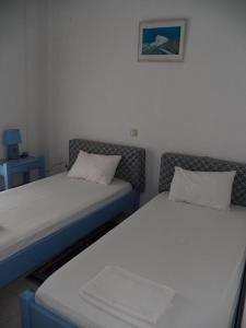 Postel nebo postele na pokoji v ubytování Villa Marina