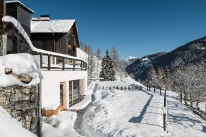 Το Les Dolomites Mountain Lodges τον χειμώνα