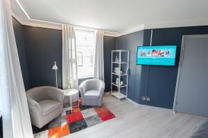 TV a/nebo společenská místnost v ubytování Hotel Stensson