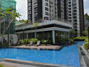 a large swimming pool in front of a building at MU Midhill l Genting Premier Suite in Genting Highlands