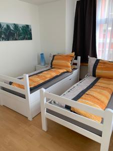 Postel nebo postele na pokoji v ubytování Haus zur Eiche Private 3,5 Zimmerwohnung bis zu 8 Gäste