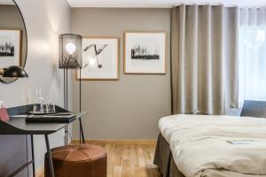 Postel nebo postele na pokoji v ubytování Högbo Brukshotell & Spa