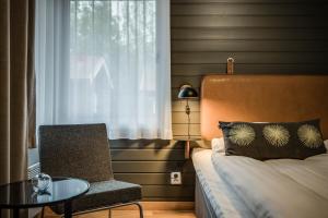Postel nebo postele na pokoji v ubytování Högbo Brukshotell & Spa