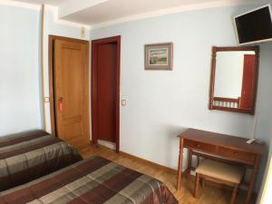 TV a/nebo společenská místnost v ubytování Hostal ** EC León