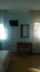 TV a/nebo společenská místnost v ubytování Hostal ** EC León