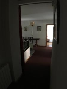 Postel nebo postele na pokoji v ubytování Hostal ** EC León
