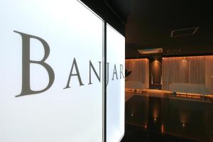 a sign for the bantara hotel in singapore at HOTEL BANJAR in Tokorozawa