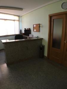 Kuchyň nebo kuchyňský kout v ubytování Hostal ** EC León