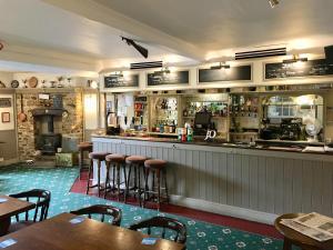 The lounge or bar area at The Greyhound Inn