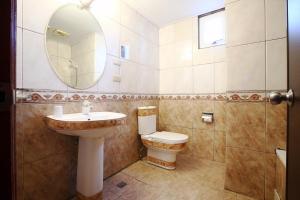 Koupelna v ubytování Hua Du Hotel