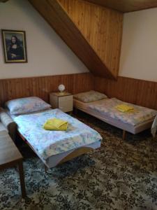 Postel nebo postele na pokoji v ubytování U Skrblíka - restaurace a penzion
