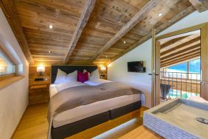 Postel nebo postele na pokoji v ubytování Gams Lodge