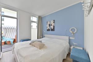 Postel nebo postele na pokoji v ubytování Ferienwohnung Trauminsel
