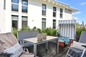 Balkón nebo terasa v ubytování Ferienwohnung Trauminsel