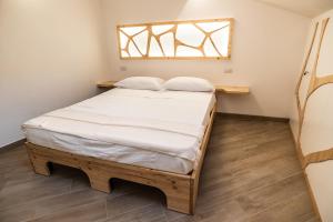 Postel nebo postele na pokoji v ubytování A Casa Di