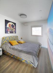 A bed or beds in a room at Casa Ricardo PARADISE Apartment