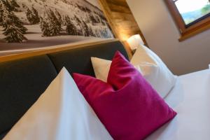 Postel nebo postele na pokoji v ubytování Gams Lodge