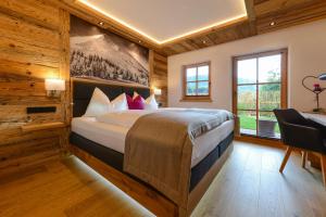 Postel nebo postele na pokoji v ubytování Gams Lodge