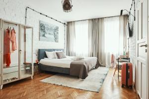 Posteľ alebo postele v izbe v ubytovaní ARTHOTEL STALOWA 52